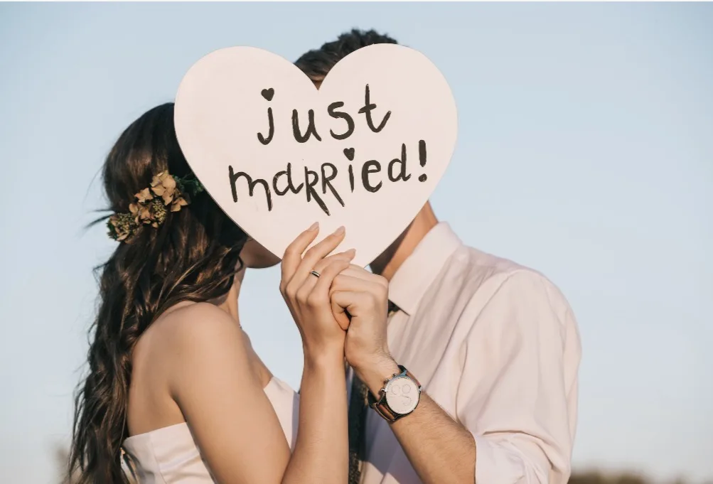 Couple smiling together during premarital counseling